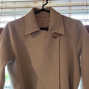 Size medium, new, wool coat by Gentle herd